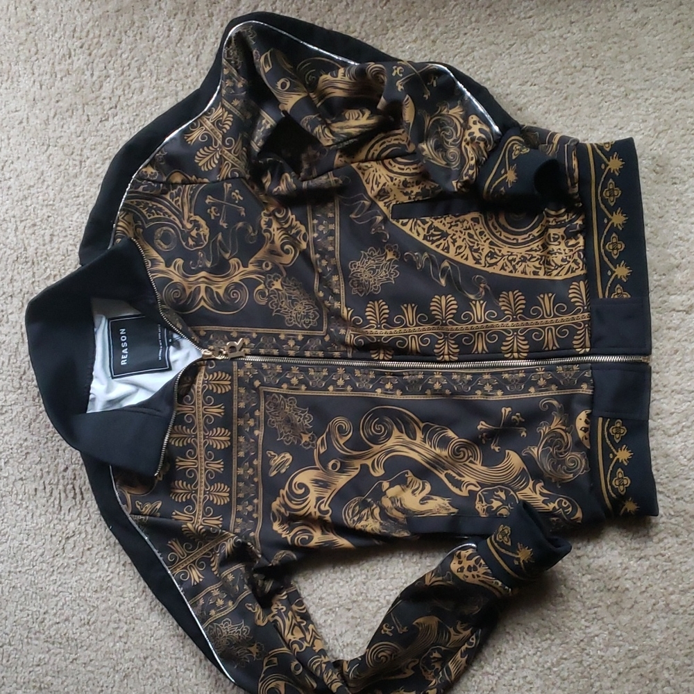 Reasons: Black and gold jacket size small in men